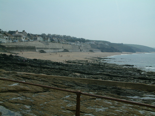 Cliff Road and Loe Bar Road above the beach, Porthleven.
            Seine house is in the centre. 30 May 2003.